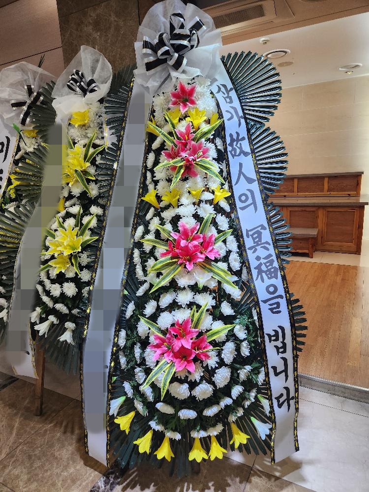주문자 박00 서울로 주문주신 근조4단화환 입니다